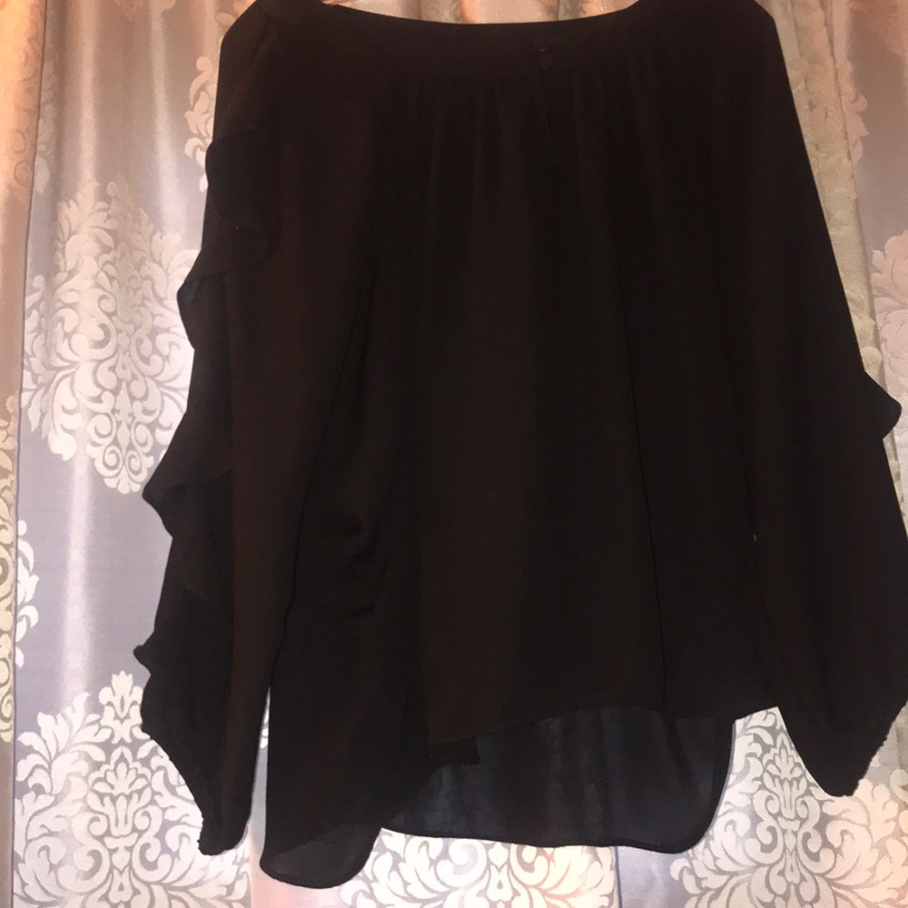 Beautiful black blouse with soft ruffle on sleeves